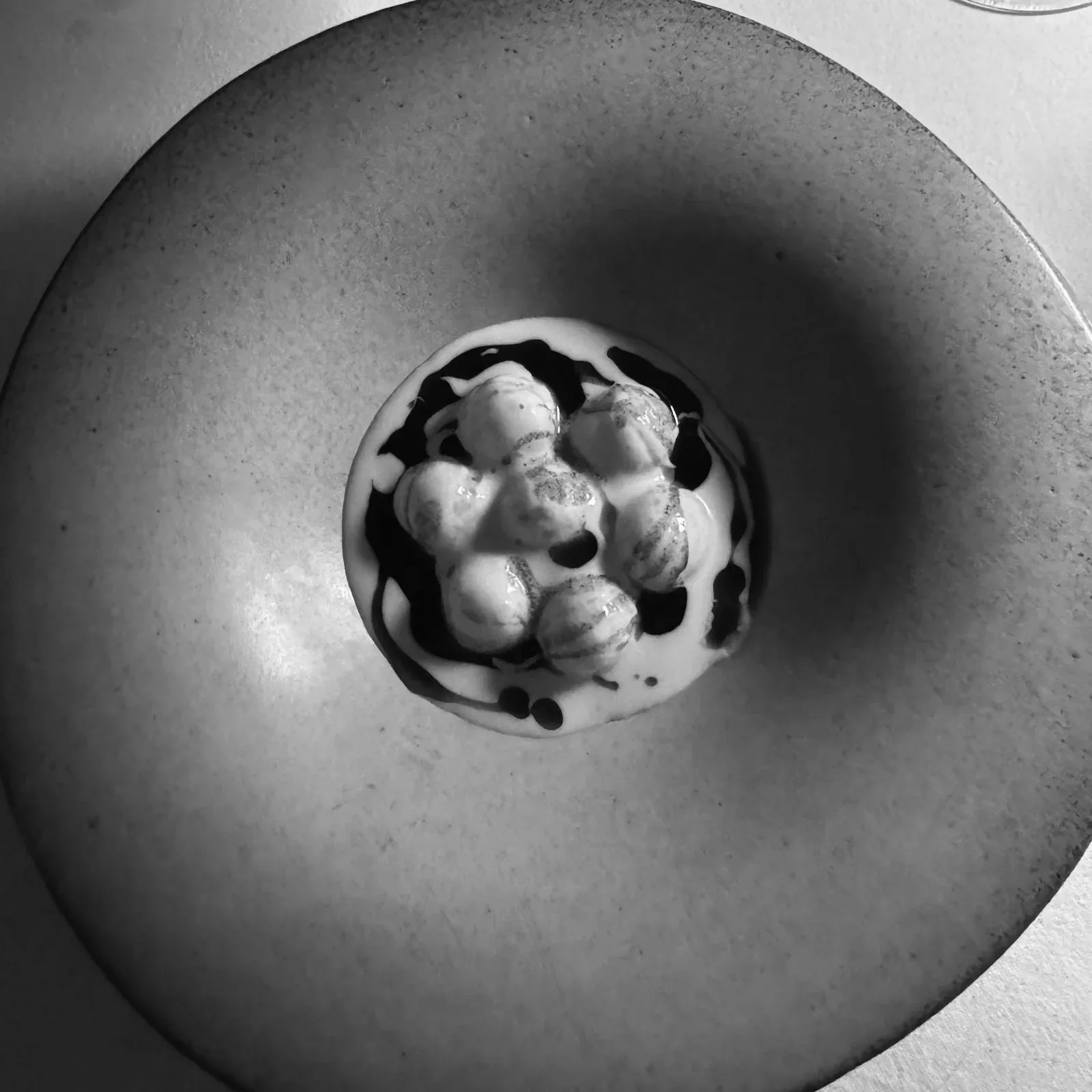White ceramic plate detail, Sicilian craftsmanship