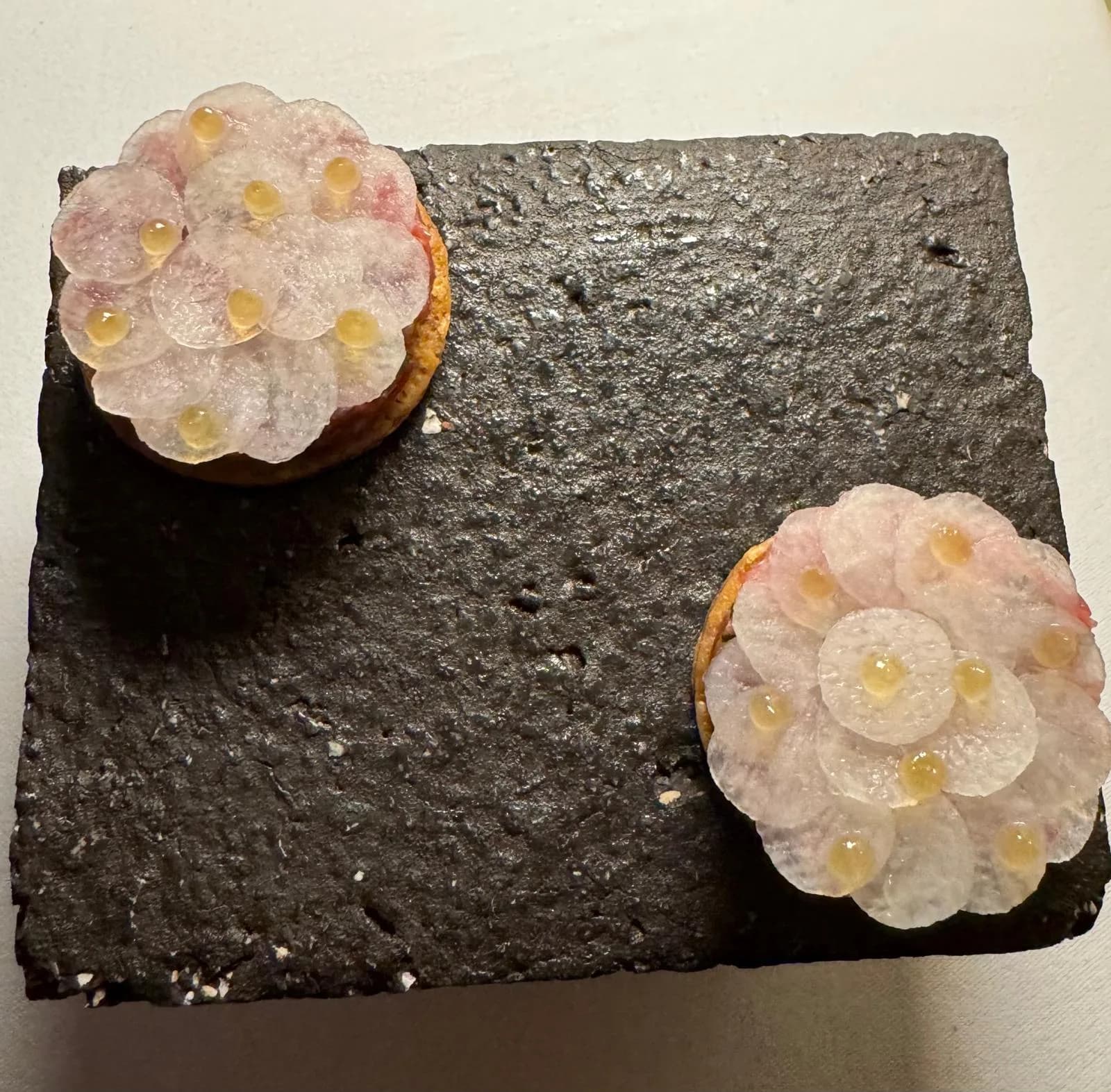 Plated dinner course at a fine dining restaurant in Cefalù