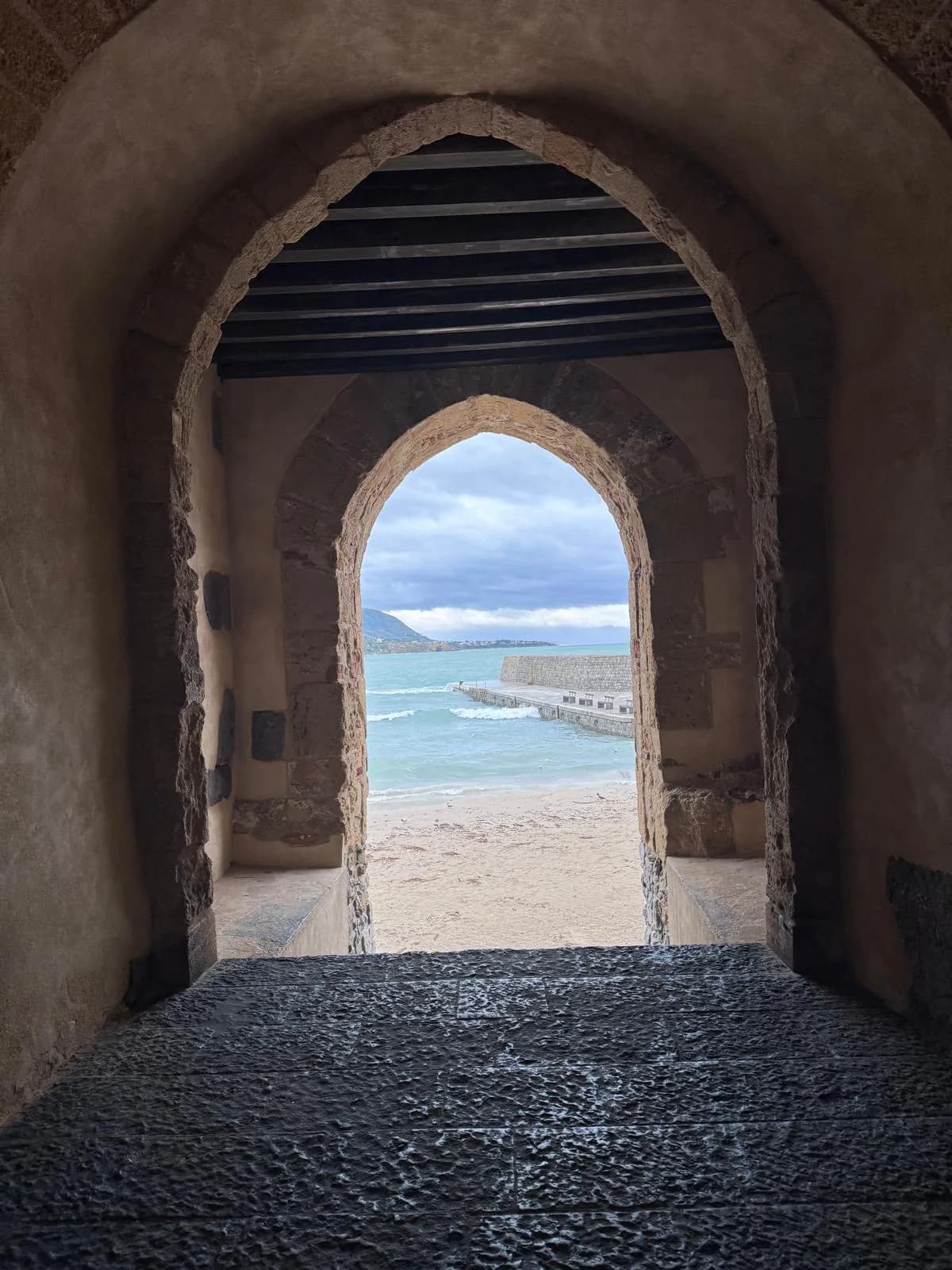 Stone arch and sea near Cefalù headland