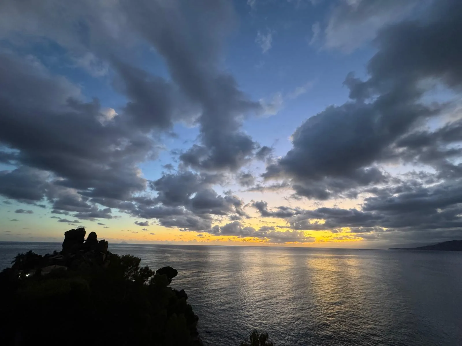 Golden-hour light over the sea near Cefalù